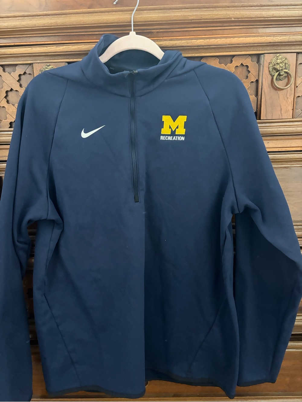 Nike Men's Navy Quarter-Zip Performance Jacket with Yellow 'M' Logo